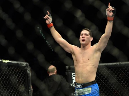 Chris Weidman celebrates victory over Anderson Silva