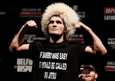 Irreverent, Nurmagomedov (photo) shows off his characteristic wig and a shirt teasing jiu-jitsu. Photo: Josh Hedges/UFC