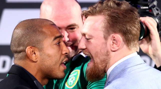 Confirmação de duelo entre Aldo (esq.) e McGregor (dir.) deve ficar para os últimos momentos. Foto: Cathal Noonan/INPHO