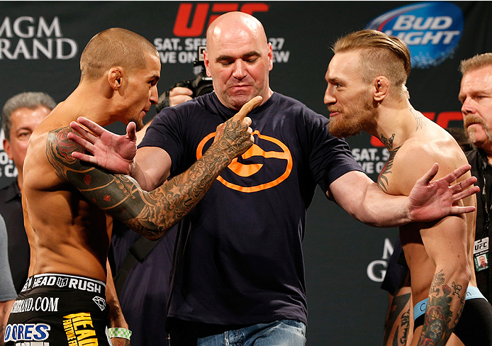 Poirier (esq.) enfrentou McGregor (dir.) em setembro do ano passado. Foto: Divulgação/UFC